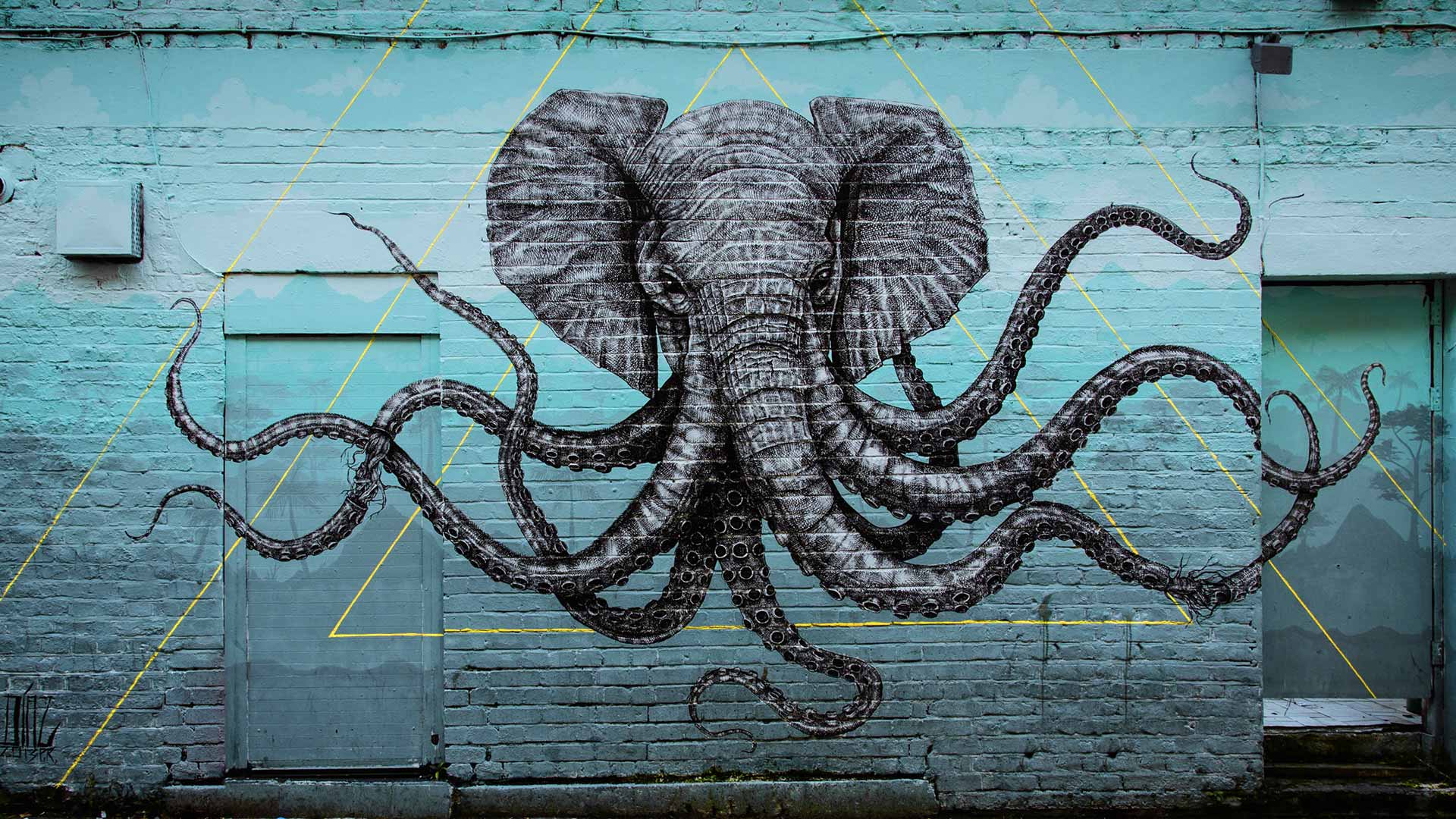 street art d'un éléphant avec des tentacules de pieuvres